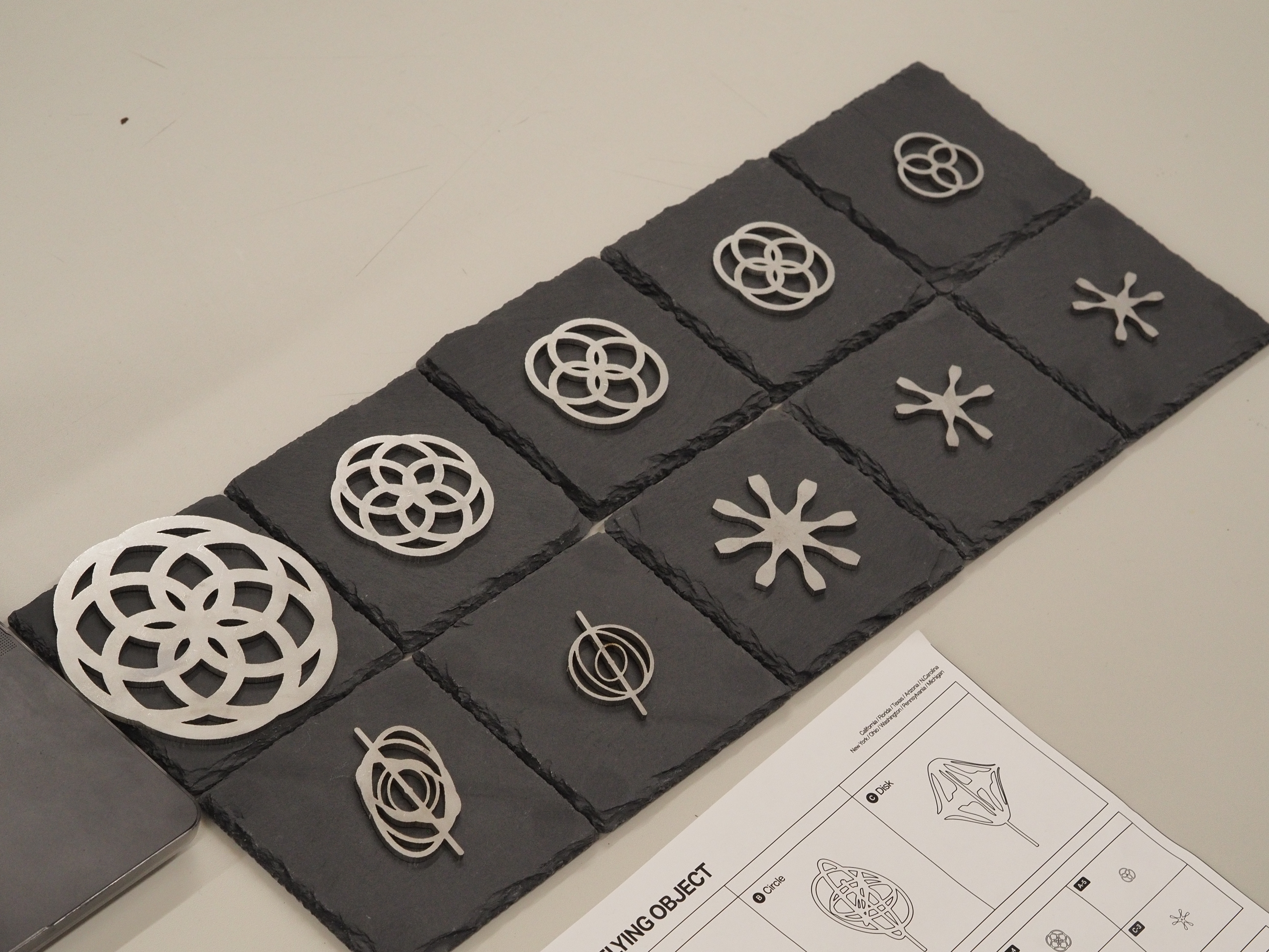 I 3D-printed crop circles visualizing the UFO sighting counts and the most frequently observed type for each of the 10 states. To represent UFOs, I chose a metallic texture for the prints.