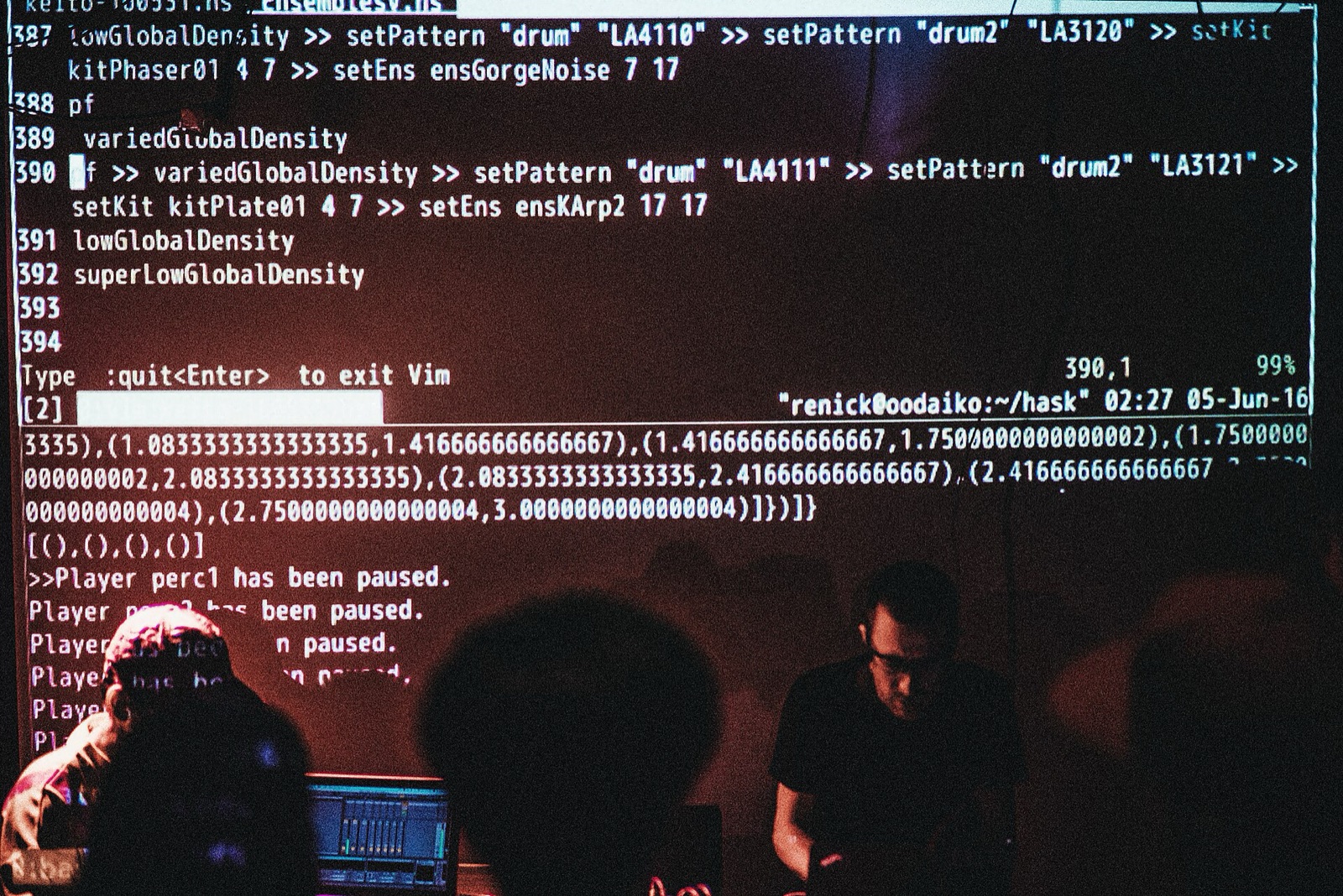 Renick Bell live coding in front of projected source code